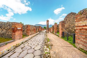 Ruins of Pompeii near Naples, Italy. Pompeii is an ancient Roman city. Mount Vesuvius. Panorama of abandoned street in Pompei.