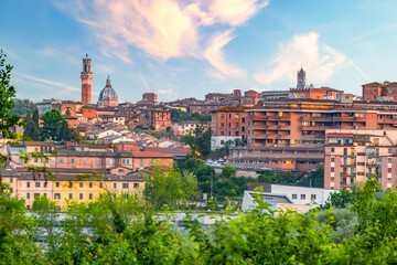 Siena, medieval town in Tuscany, with view of the Dome & Bell Tower of Siena Cathedral,  Mangia...