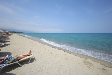 Sandy beach with sunbeds on the Olympic Riviera, Nei Pori, Pieria - Greece