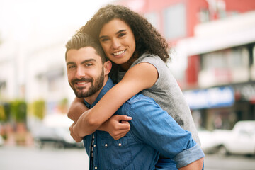 Happy, portrait and couple with piggyback in outdoor love, bonding and peace on date together, adventure and vacation in city. Smile, woman and man with embrace, care or relax in summer for romance