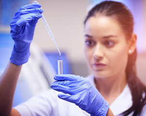 Chemical, woman and scientist with test tube and pipette in laboratory for investigation,...