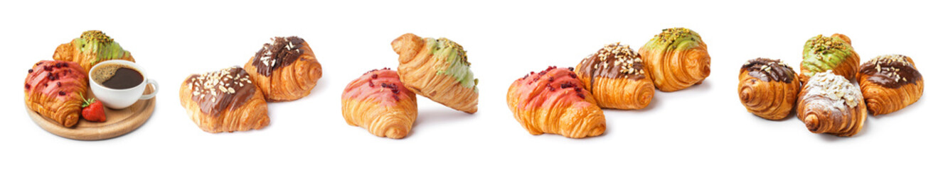 Set of tasty sweet croissants on white background