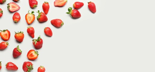 Many fresh strawberries on white background with space for text, top view