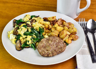 scramble eggs with spinach and mushrooms with  home fries