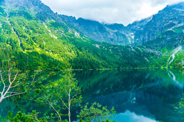 Tatra National Park in Poland. Mountains lake Morskie oko or Sea Eye lake In High Tatras. Five lakes valley
