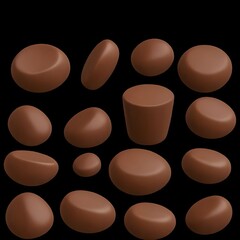 a black background with a collection of various shaped and sized chocolate pieces.