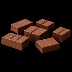 a black background with a collection of various shaped and sized chocolate pieces.