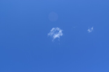 Blue sky background with white clouds