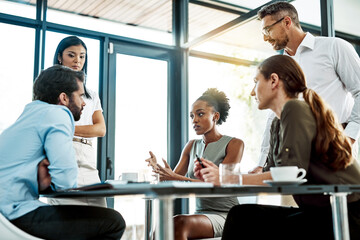 Meeting, talk and business people in office with teamwork for planning strategy, brainstorming and monthly goal review. Cooperation, support and staff for consulting agency with feedback discussion