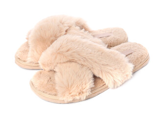 Pair of beige soft slippers isolated on white