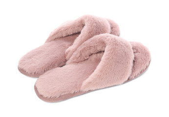 Pair of pink soft slippers isolated on white