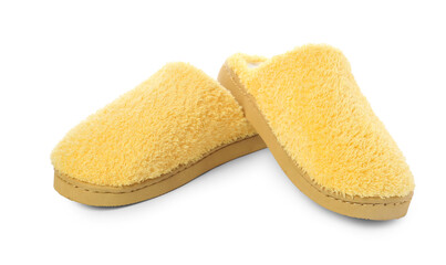 Pair of yellow soft slippers isolated on white