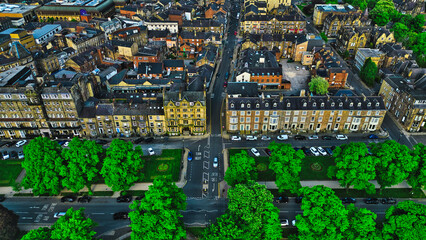 Fototapeta premium Aerial view of cityscape with historic and modern buildings in Harrogate, North Yorkshire