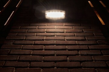Brick wall closeup at night