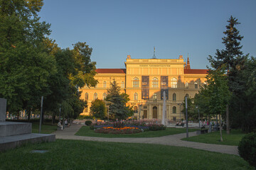 City center in Szeged during summer evening.Ungar Mayer palace in background.