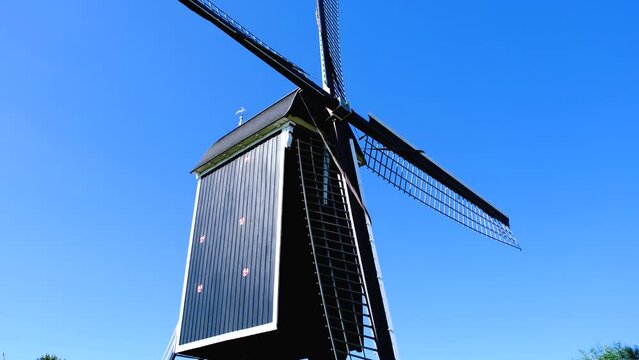 Close up view of Korenmolen 't Vliegend Hert, Flour mill 't Vliegend Hert in the fortified city of Brielle, South Holland, Netherlands.