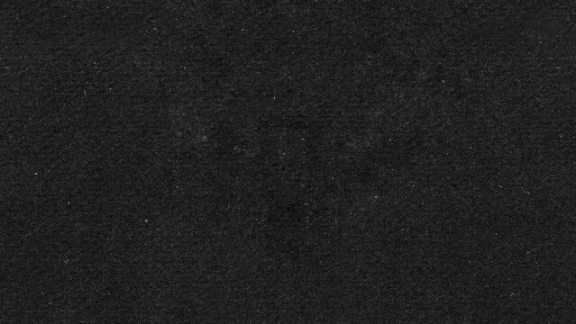 Scratches and dust dark grunge paper background. Loop. 4K animated video.