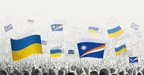 People waving flag of Marshall Islands and Ukraine, symbolizing Marshall Islands solidarity for Ukraine.