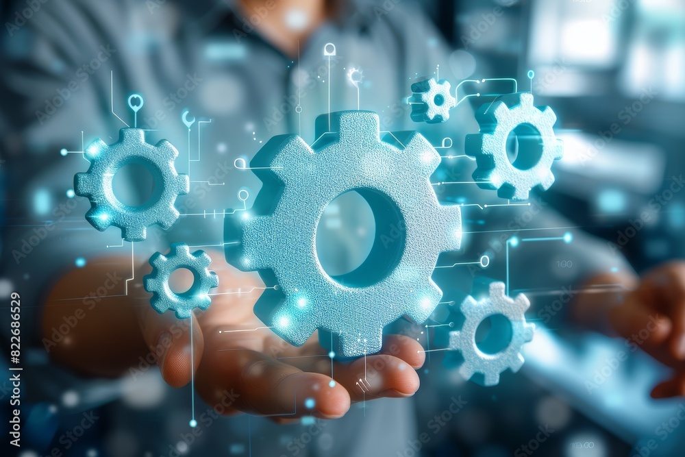 Poster Hand touching a digital interface with interconnected gears, symbolizing the intricate and innovative technology involved in modern digital systems and engineering mechanisms