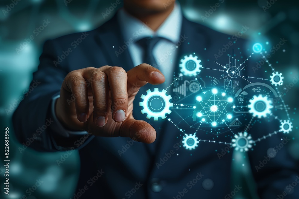 Poster Hand touching a digital interface with interconnected gears, symbolizing the intricate and innovative technology involved in modern digital systems and engineering mechanisms