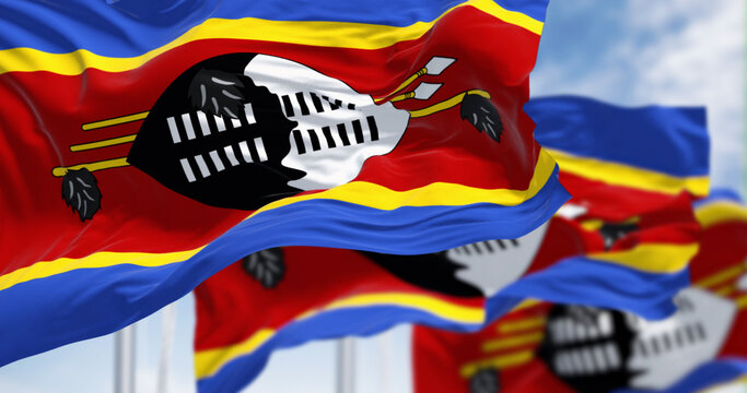 Close-up of Eswatini national flags waving a clear day - Powered by Adobe