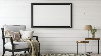 Elegant black frame on a white shiplap wall, above a cozy reading nook with a comfy chair and side table.