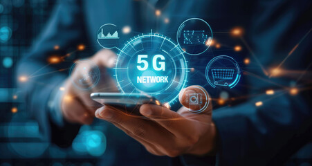 Fototapeta premium Businessman with 5G hologram on his hand and element of this image furnished, smart city and network connect concept