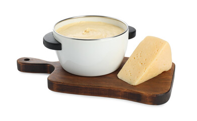 Fondue with tasty melted cheese and piece isolated on white