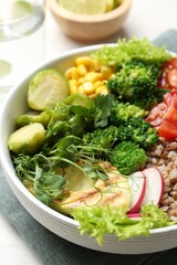 Healthy meal. Tasty products in bowl on white table, closeup