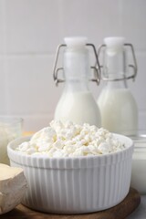 Dairy products. Fresh cottage cheese and milk on table, closeup