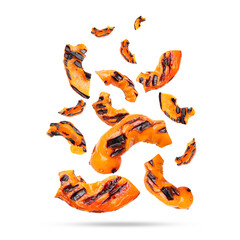 Slices of grilled bell peppers in air on white background