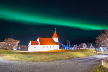 Aurora borealis in village of Hrisey in North Iceland