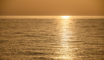 Golden hour shot of the sun setting over the Mediterranean Sea