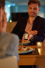 Engagement, proposal or couple with ring in restaurant for celebration, wedding or marriage commitment. Night, date or happy man with diamond jewelry surprise for love, promise or asking question