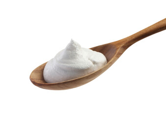 Wooden spoon with sour cream isolated on white