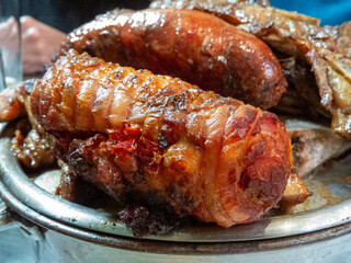 Barbecued stuffed chicken rolls