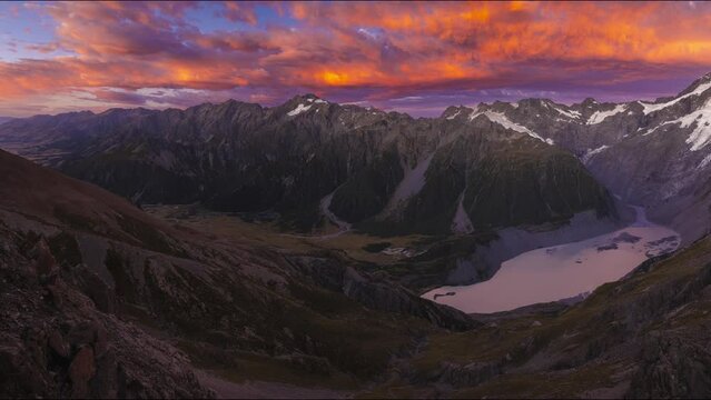 Sunrise from Mt Wakefield overlooking Mueller Lake and Mt Sefton in NZ Aoraki/Mt Cook National Park