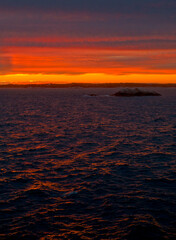 Fototapeta premium Brilliant Orange Sunset Over the Ocean
