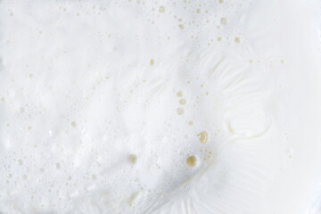 fresh organic whole milk with cream and bubble texture isolated ready for drink,making yogurt,sweet...