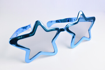 blue star shape of glasses on white background