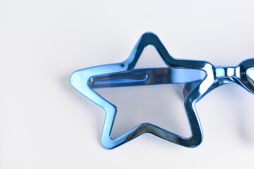 blue star shape of glasses on white background