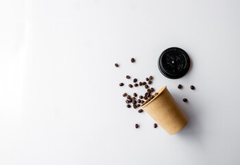 Elegant Coffee Cup with Fresh Beans on Modern Black and White Surface