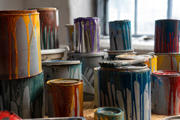 Paint Cans. Used cans of colored paint. Oil-based enamel, lacquer, shellac and varnish leftovers....