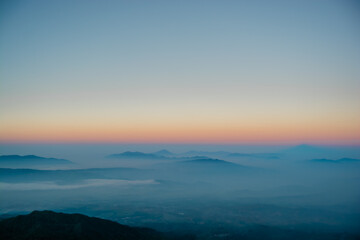 View of the golden hours of light that occurs when the sun begins to rise on Mount Ciremai, West...
