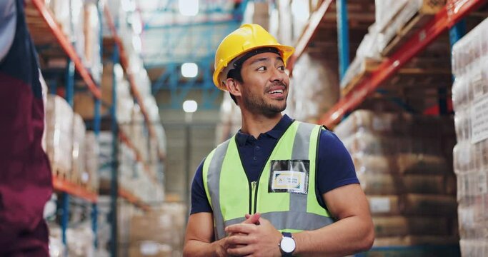 Man, construction and talking in engineer in warehouse, planning and conversation with architect for factory expansion. Professional, employee and industrial business with people, helmet and safety