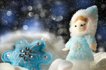 Christmas decorations, baubles, knick knack toys, pretty doll,  snowing.  Happy New Year and Merry...