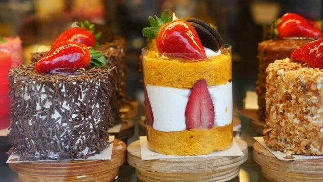 chocolate and cream cake display for sale at cafe 