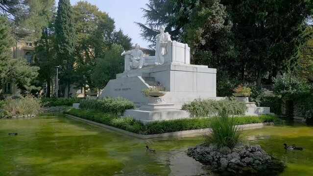 Bergamo cinematic movement approaching the Gaetano Donizetti monument located near the homonymous theater