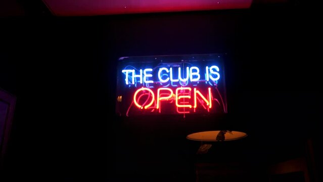 Neon sign the club is open