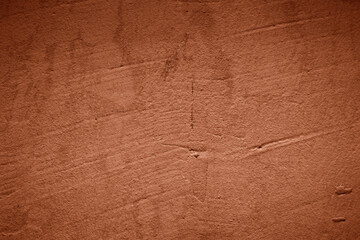 Abstract background of an exterior brown style textured wall surface